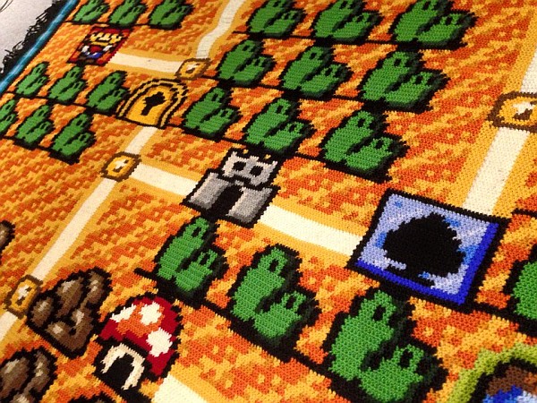 Ser nerd é ficar 06 anos fazendo um tapete de crochê do mapa do Super Mario Bros 03